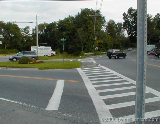 010818NorthEndOfCRT Let's head back from the northeast end of the CRT, at School and Central in Saxonville. The CRT starts at that street sign. The near end of the crosswalk aims right at it; we hope Framingham will line up the far side, as well.