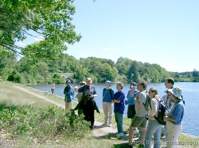 040612JillLeadsNatureWalk Many outdoor events are held every year along or close by the Cochituate Rail Trail. Here, Jill Miller explains natural history on a walk along the granite wall that kept silt out of the adjacent Cochituate Aqueduct Gate House, just north of Route 30 and the Snake Brook Trail.