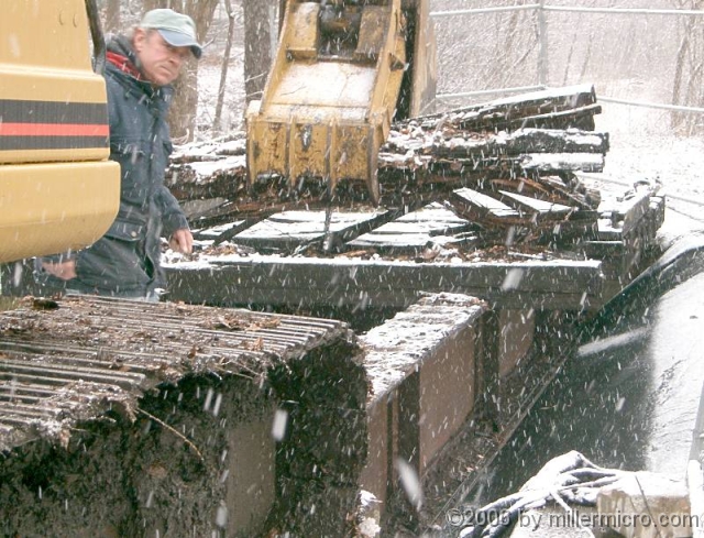 050105CRTBridgeDeck2 A bucket with extra teeth takes a big bite...