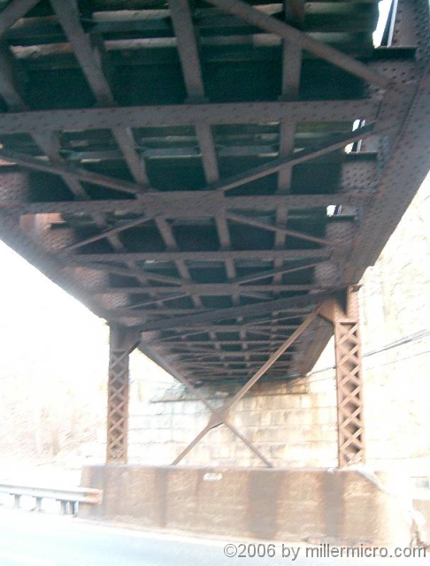 060416Rte9CRTBridge3 The Route 9 bridge is strong enough to hold a locomotive, but it will need paint and a redesigned deck.