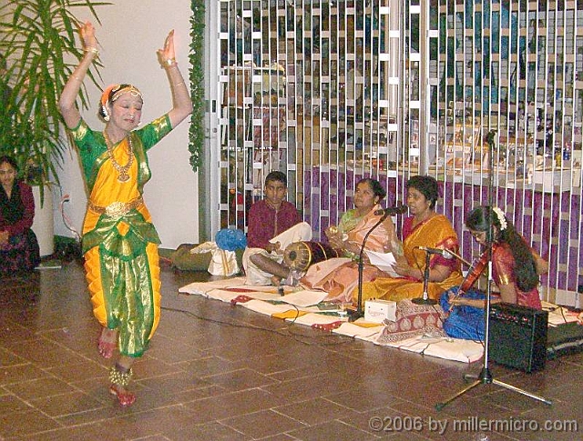 LSOIndiaDanceSavitri1 <a href=http://www.lokvani.com/lokvani/article.php?article_id=1015>Amudha Pazhanisamy</a> of Lexington High School dances, accompanied by Arun Saigal on two-sided drum, Geeta Murali singing and on tambur, choreographer Ranjani Saigal (founder of the Eastern Rhythms School of Dance) narrating, and Rasika Murali on violin.